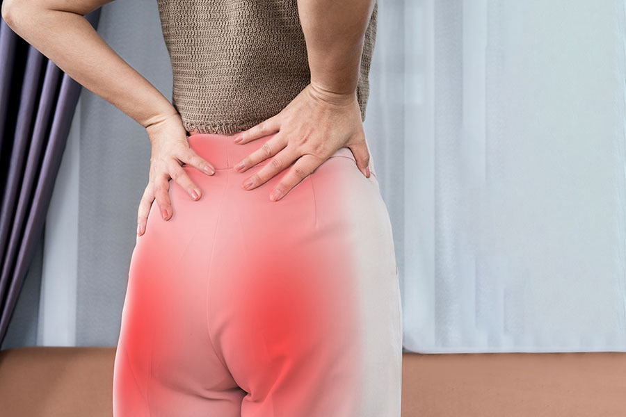 How To Relieve Buttock Muscle Pain - Featured Image